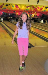 Another mother and I took the church youth group on a bowling trip.  I guess you can tell Emma wasn't a great bowler, but it was fun anyway!  Here she is hamming it up after her gutterball.