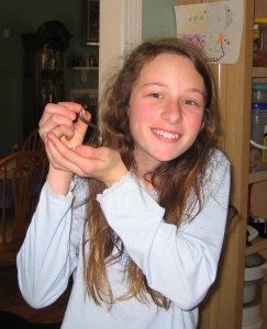 Emma in her pjs, holding a little snake I found In the yard.  Emma Kate Roey, Emma Roey, Emma Katherine Roey Emma Buchheim